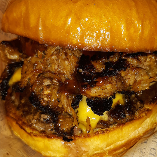 SC Grill Catering Mouth Watering Sow Cow Pulled Pork Topped Texas Burger For Corporate Lunch Catering in Hernando County