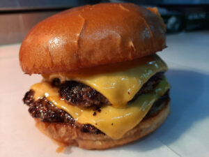 SC Grill's Mouth Watering Double Cheese Burger
